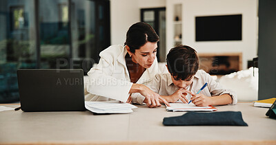 Buy stock photo Education, family and remote work mother with son in home for business or homework task. Laptop, learning and writing with boy child and single parent woman at counter for freelance or study