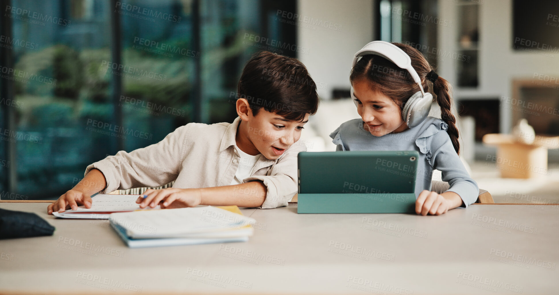 Buy stock photo Homework, help and children in home with tablet, online activity and project on academic app. Homeschool, tech and siblings in kitchen with teamwork, lesson or assessment for remote education