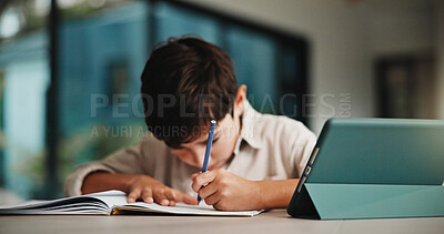 Buy stock photo Homework, writing and child in home with tablet, online activity and document for academic app. Homeschool, tech and boy in house with website, digital lesson or assessment in remote education