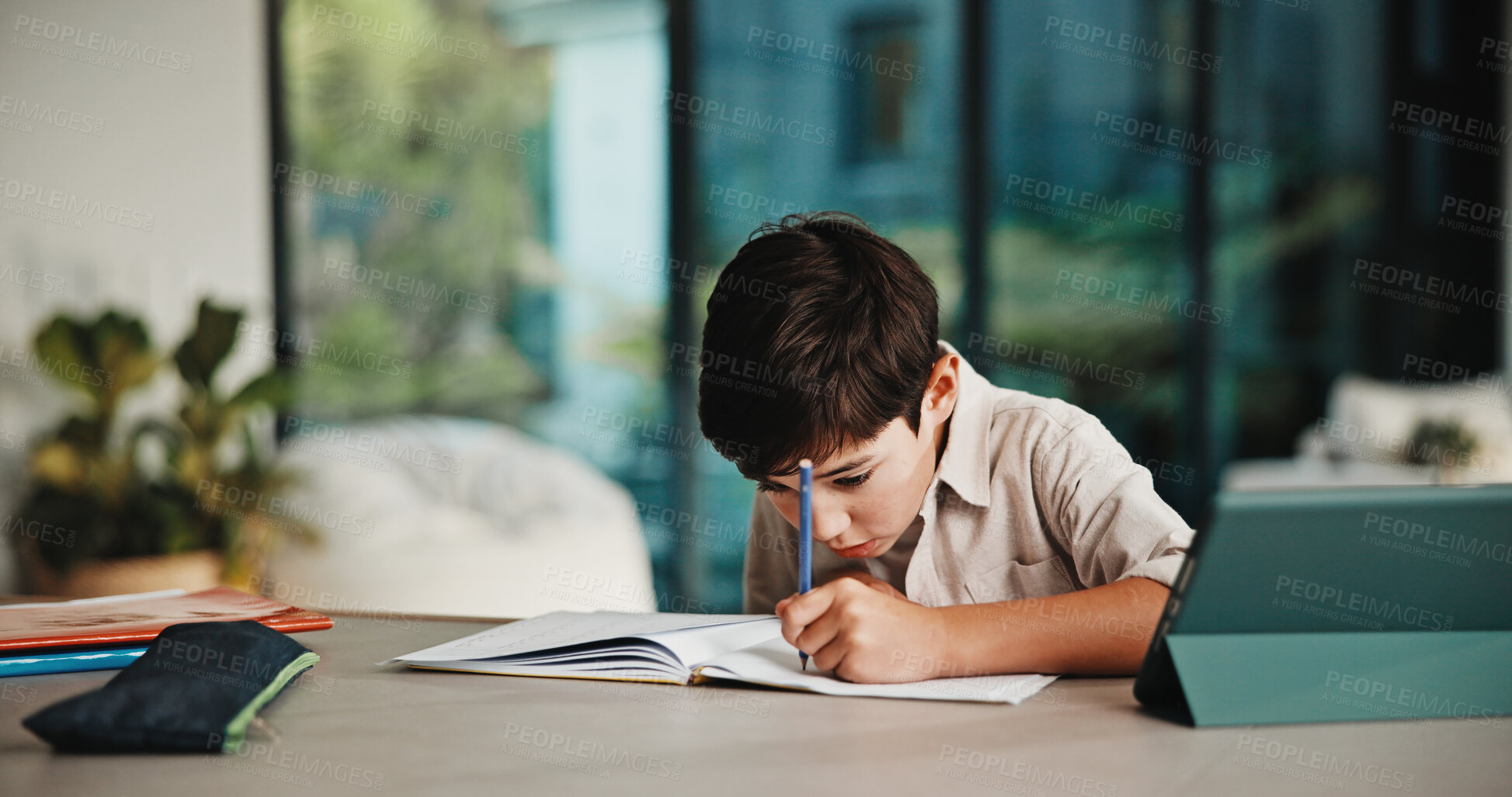 Buy stock photo Homeschool, writing and child in home with tablet, online activity and document for academic app. Homework, tech and boy in house with website, digital lesson or assessment in remote education