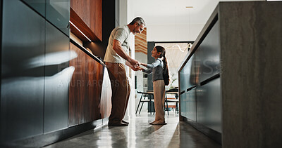 Buy stock photo Daughter, holding hands and smile of dad in kitchen for bonding, development or guidance. Love, safety or support with girl child and single parent man in apartment for growth, security or trust