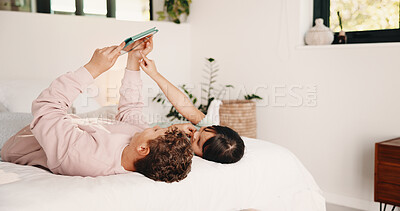 Buy stock photo Brother, sister and tablet on bed in home for development, elearning or sharing as children. App, educational game and sibling kids in bedroom of apartment together for bonding, growth or playing