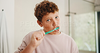 Buy stock photo Toothbrush, dental care and portrait of kid in bathroom for development, growth or hygiene in home. Fresh breath, wellness and boy child brushing teeth in morning for plaque removal and oral health.