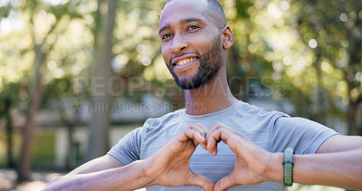 Buy stock photo Heart, fitness and black man in park for exercise, runner and sports for cardio health outdoor. Athlete, nature and person with emoji, hands and sign for practice, hobby and challenge for wellness