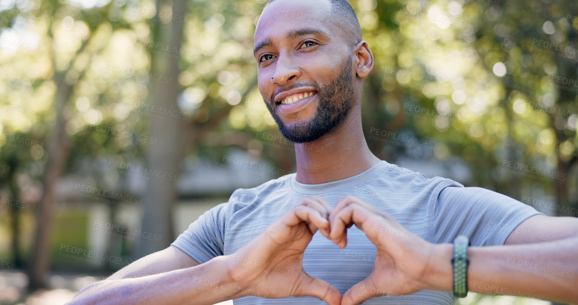 Buy stock photo Heart, fitness and black man in park for exercise, runner and sports for cardio health outdoor. Athlete, nature and person with emoji, hands and sign for practice, hobby and challenge for wellness