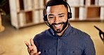 Telemarketing, man and smile with headset in call center for agent, explain service and offer. Friendly, sales consultant and chat to outbound client for lead generation, negotiation and closing deal