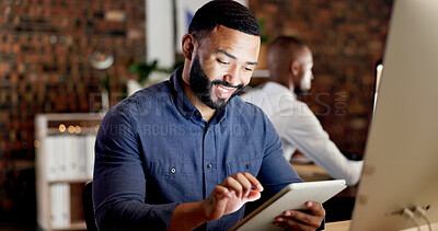 Buy stock photo Reading, smile and man with tablet in office, planning system update and software development at night. Tech, late and app developer with testing for digital feature, programming or project deadline