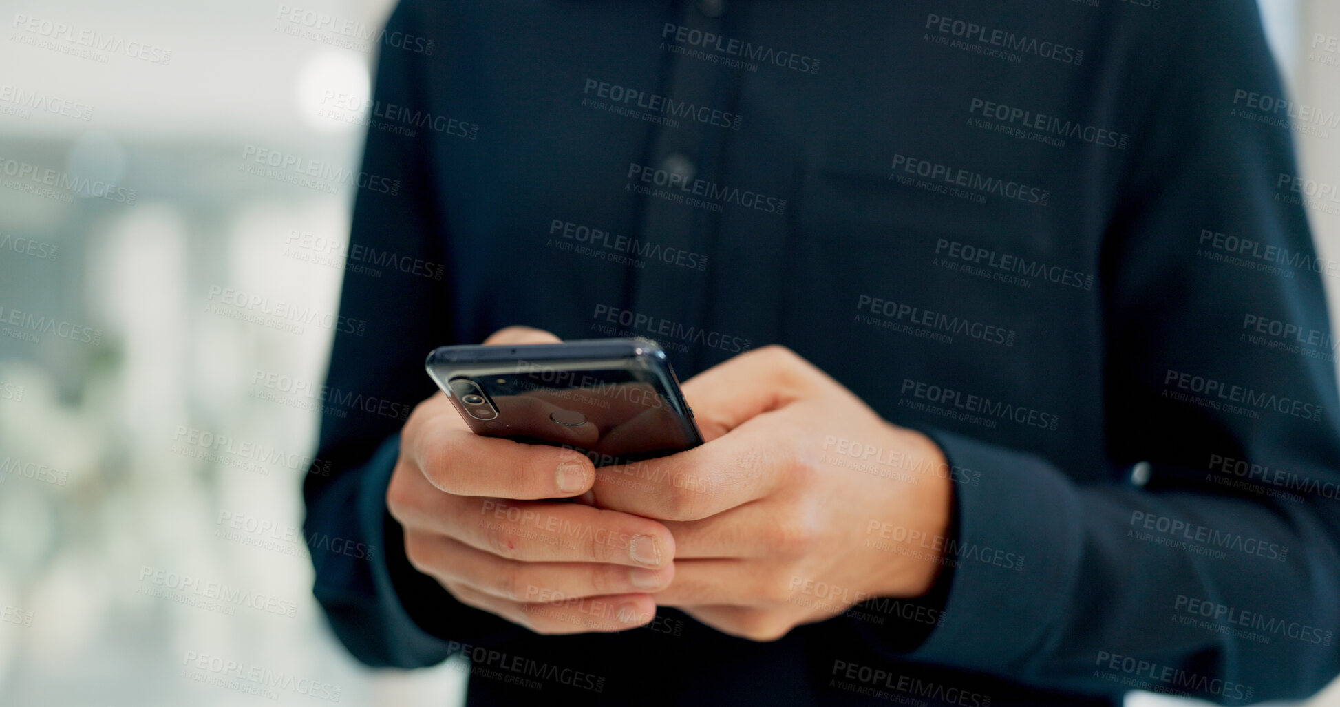 Buy stock photo Businessman, hands and typing with phone in office for conversation, social media or schedule. Man, employee or texting with smartphone for mobile network app, connection or online chat in workplace