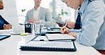 Woman, writing and notebook with business people in meeting for financial report, budget proposal and notes. Corporate, teamwork and person for investment strategy, planning and finance agenda