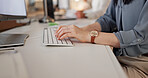 Typing, keyboard and hands of businesswoman in office with email for feedback on finance report. Professional, online and female financial manager with update on investment proposal in workplace.