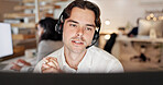 Computer, microphone and man consulting in call center for language translation, help desk or faq. Coworking, tech and consultant at work for customer service, multilingual support and online advice