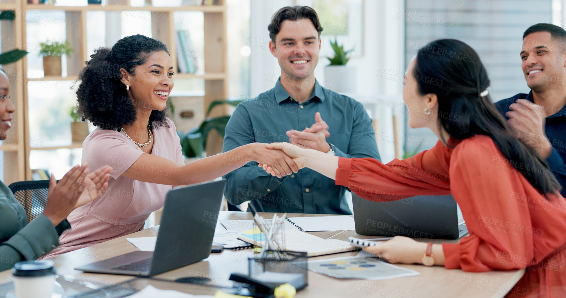 Buy stock photo Handshake, winning and business woman in celebration, meeting or teamwork together at office. Shaking hands, applause and success for team goals, achievement or company promotion at workplace