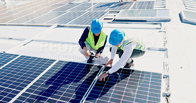Buy stock photo Men, engineer and team for solar panel with tablet on roof, discussion or inspection with installation. People, technician and architect with tech, application or sustainability with renewable energy