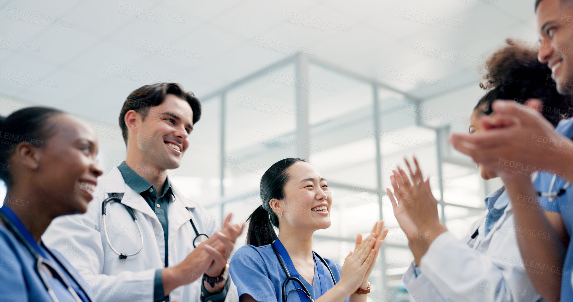 Buy stock photo Doctors, nurses and applause in hospital for healthcare, medical achievement and team support. People, cardiology department and clapping in clinic for collaboration, surgery success and announcement