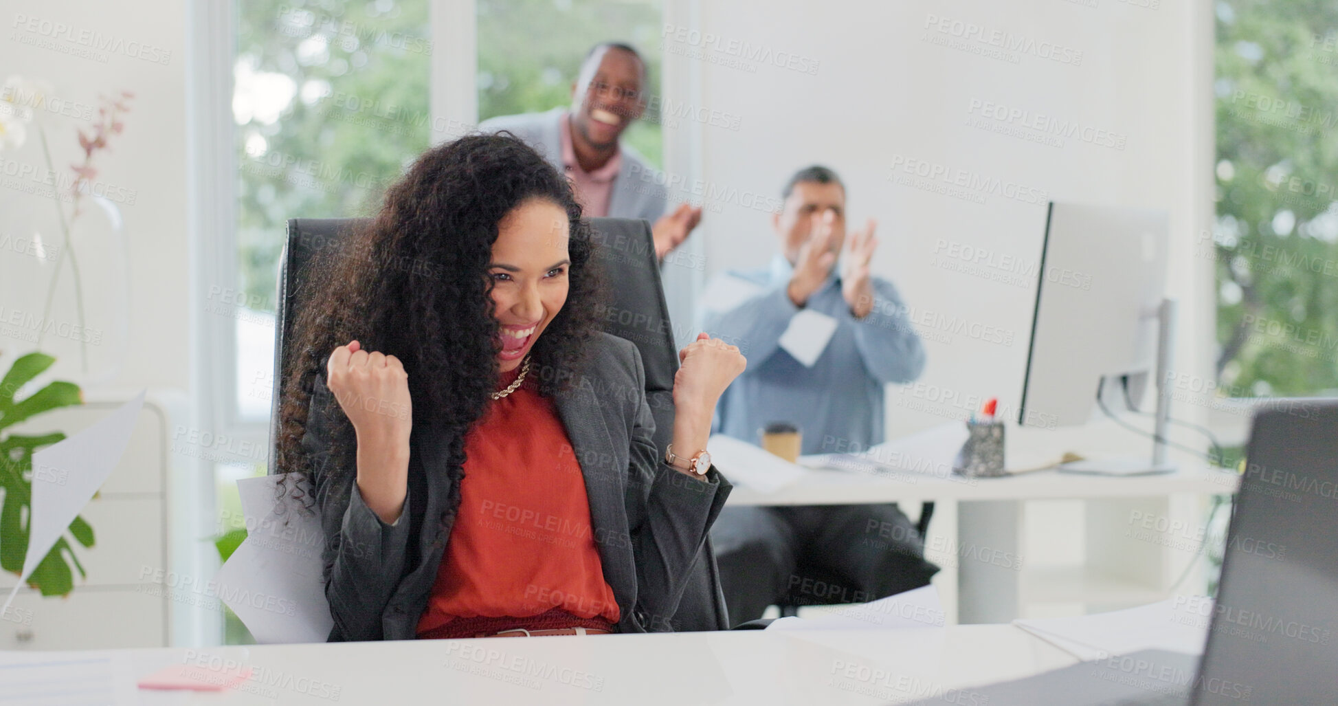Buy stock photo Excited, woman and fist pump in office with laptop, investment approval or team clapping for success. Happy, person and celebration in business with computer, funding offer and coworkers applause.