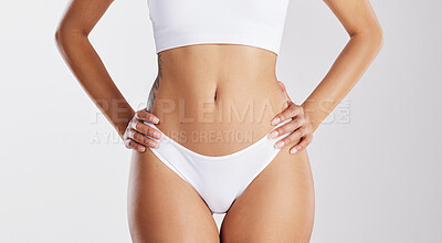 Buy stock photo Wellness, body and belly in studio with underwear, gut health and inspiration with detox goals. Healthy, stomach and woman with undergarments, weight loss and diet transformation on white background.