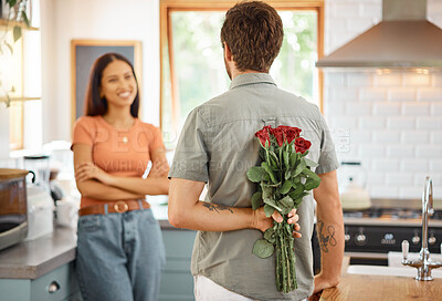 Buy stock photo Happy, couple and surprise with flowers in home for love, partner appreciation and anniversary gift. Smile, people and roses for romantic gesture, gratitude and hiding present on special occasion
