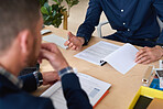 Two businessmen meeting in office discussing business entrepreneurs planning startup partnership deal for company looking at contract documents