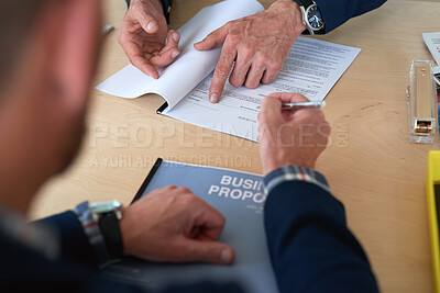 Buy stock photo Hands, contract and signature with business proposal for review, agreement or b2b collaboration. People, paperwork and compliance for partnership, point and explain with deal for project at agency