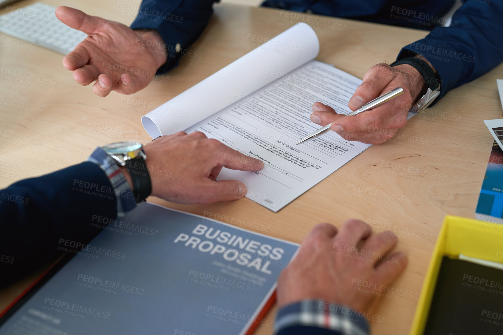 Buy stock photo Hands, documents and signature with business proposal for review, contract or b2b collaboration. People, paperwork and compliance for partnership, point and explain with deal for agreement at agency