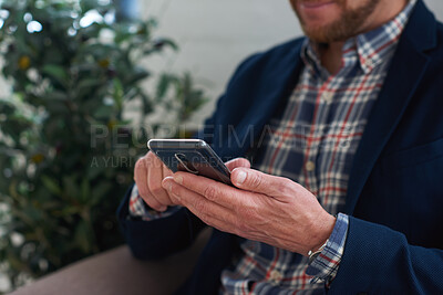 Buy stock photo Phone, hands and businessman in office for texting, networking or social media on mobile app. Technology, typing and male employee with cellphone for online email for feedback on project in workplace