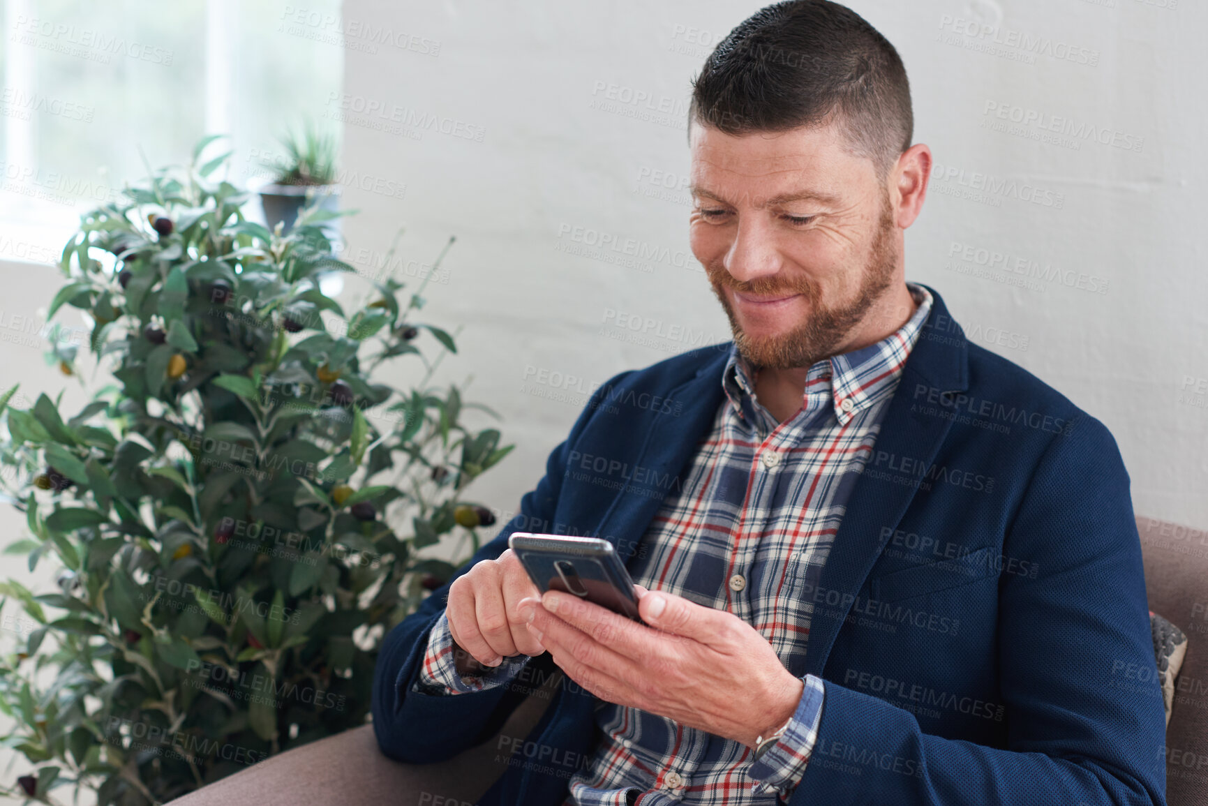 Buy stock photo Phone, happy or businessman in office for texting, networking or social media on mobile app. Technology, smile and mature employee with cellphone for online email for feedback on project in workplace