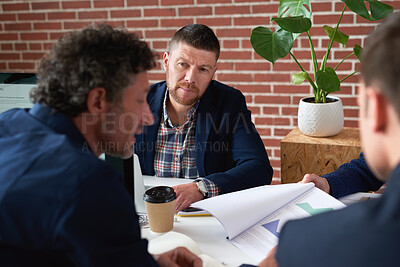 Buy stock photo Paperwork, meeting and business men in office for finance negotiation, report or conversation. Discussion, documents and male financial manager with clients for investment contract in workplace.
