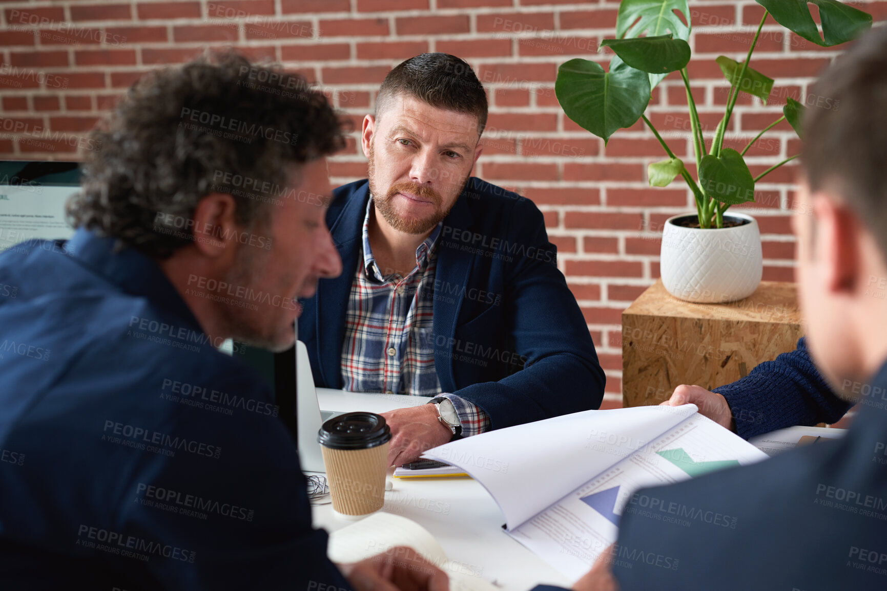 Buy stock photo Paperwork, meeting and business men in office for finance negotiation, report or conversation. Discussion, documents and male financial manager with clients for investment contract in workplace.