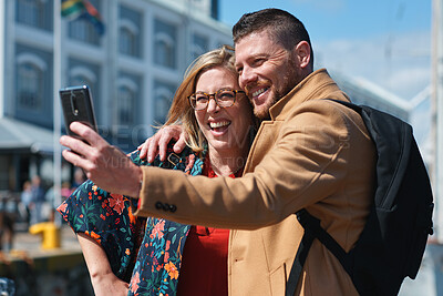 Buy stock photo Travel, happy and selfie of couple in city for memory, profile picture and online post for social media. Marriage, outdoor and man with woman embrace with photo for holiday, vacation and tourism