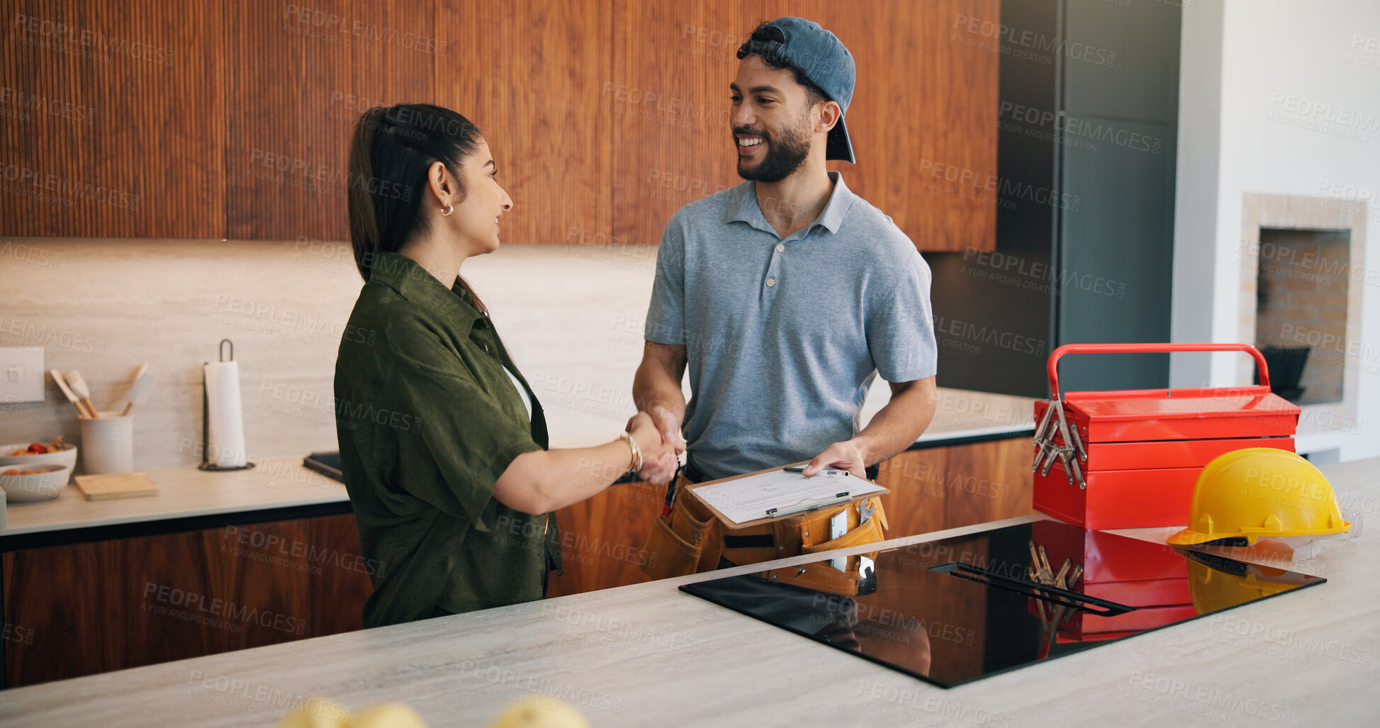 Buy stock photo Smile, woman and handshake with plumber in home for welcome, introduction and maintenance deal. Happy, person or shaking hands with technician, inspection clipboard and agreement for plumbing service