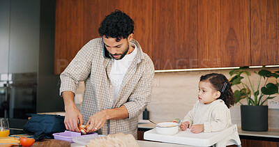Buy stock photo Dad, phone call and lunchbox for child in kitchen, multitasking and sandwich for daycare in morning. Family, breakfast and packing healthy food for school, serious or man with mobile for chat in home