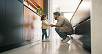 Father, child and holding hands in home for care, love and conversation together with toddler. Kid, support and dad with girl in kitchen for connection, safety and chat to single parent at house