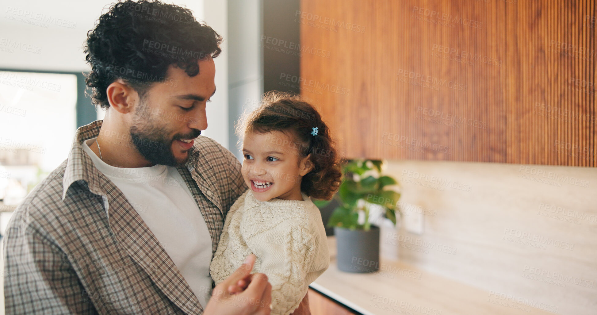 Buy stock photo Dad, holding hands and toddler girl in kitchen of home together for bonding, love or security as family. Cute, growth and smile of daughter with single parent man in apartment for playful connection