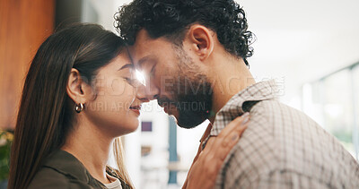 Buy stock photo Couple, forehead touch and love in home, care and bonding with smile or commitment for relationship. Calm, woman and affection for man on weekend, romance and support for partner and relax in house