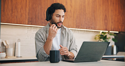 Buy stock photo Headset, laptop and remote work with man in kitchen of home for customer service or support. Coffee, computer and virtual assistance with freelance agent at counter in apartment for communication