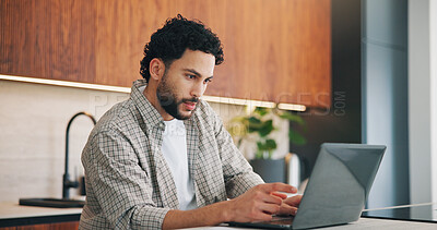 Buy stock photo Remote work, review or man in kitchen with laptop, proofreading or novel editing in home. Reading, wfh or author in house with tech, typing manuscript or chapter planning in story development.