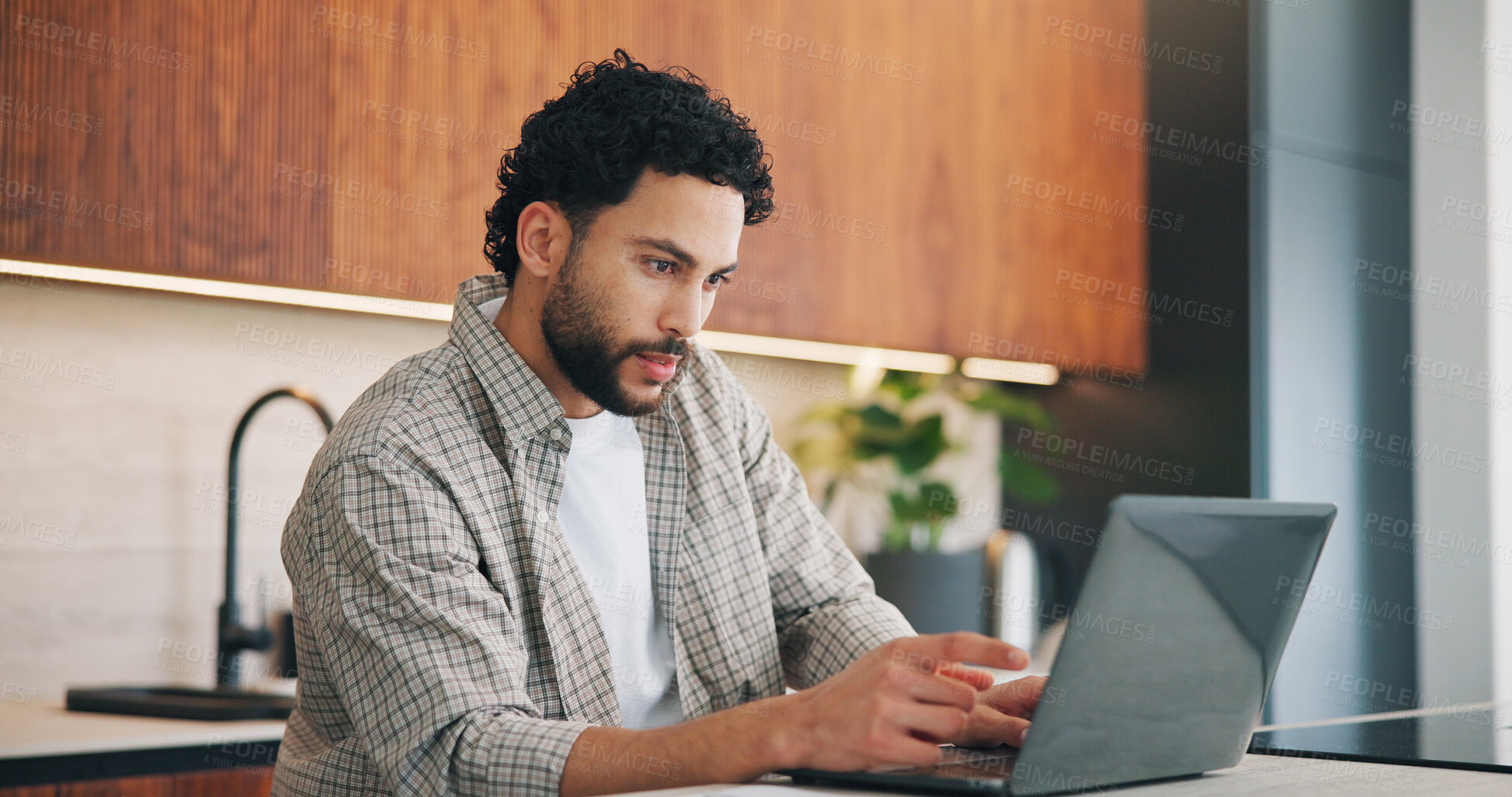 Buy stock photo Remote work, review or man in kitchen with laptop, proofreading or novel editing in home. Reading, wfh or author in house with tech, typing manuscript or chapter planning in story development.
