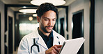 Healthcare, tablet and doctor with smile in clinic for digital records, schedule or medical app. Tech, hospital and professional man with reading, planning and scroll for online results in hallway