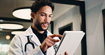 Medical, tablet and doctor with smile in hospital for digital records, schedule or healthcare app. Tech, clinic and professional man with reading, planning and scroll for online results or update
