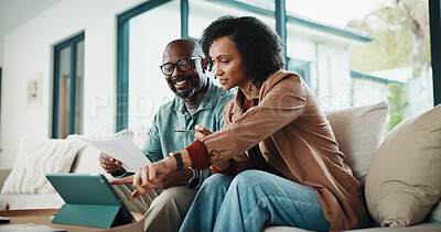 Buy stock photo Paperwork, home and couple with tablet, insurance or asset management for mortgage in living room. African man, mature woman and finance on sofa, policy document and point for investment with tech