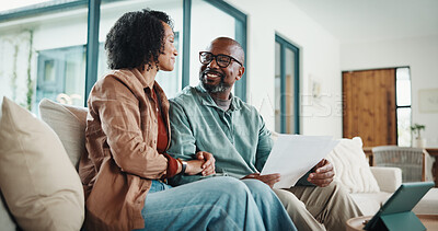 Buy stock photo Document, home and couple with smile, insurance or asset management for mortgage in living room. African man, mature woman and finance on sofa, policy paperwork and investment growth with tablet