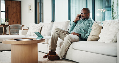Buy stock photo Phone call, talking and black man on sofa with tablet for contact, conversation and remote worker. Happy, mature and person on cellphone for communication, online chat and update for work from home