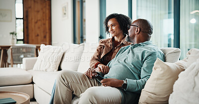 Buy stock photo Couple, watching tv and relax on couch with smile, choice and love with streaming in living room. Mature man, woman and happy with movies, television or film subscription on sofa in lounge at house