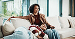 Mom, child and happy with watching tv on sofa, remote and bonding with movie choice in living room. People, mother and daughter with streaming services, laugh and comedy film on couch at family house