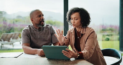 Buy stock photo Finance, argue and couple with tablet in house, savings account withdrawal and reading bank balance. Conflict, mature and African people with tech for transaction history, money dispute or debt bills