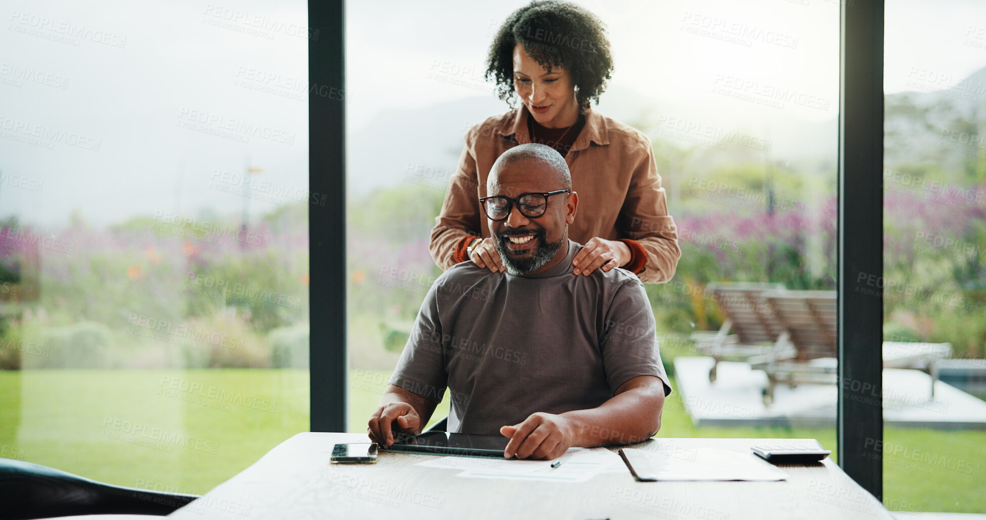 Buy stock photo Man, tablet and woman with massage for remote work from home, smile and broker with investment review. Mature couple, happy and advisor with tech for freelance job, app or partner with care in house