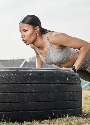 Buy stock photo Outdoor, fitness and woman with push up on tire, calisthenics workout and core endurance exercise. Active, arm training and athlete with resilience for strength challenge, breathing and muscle gain