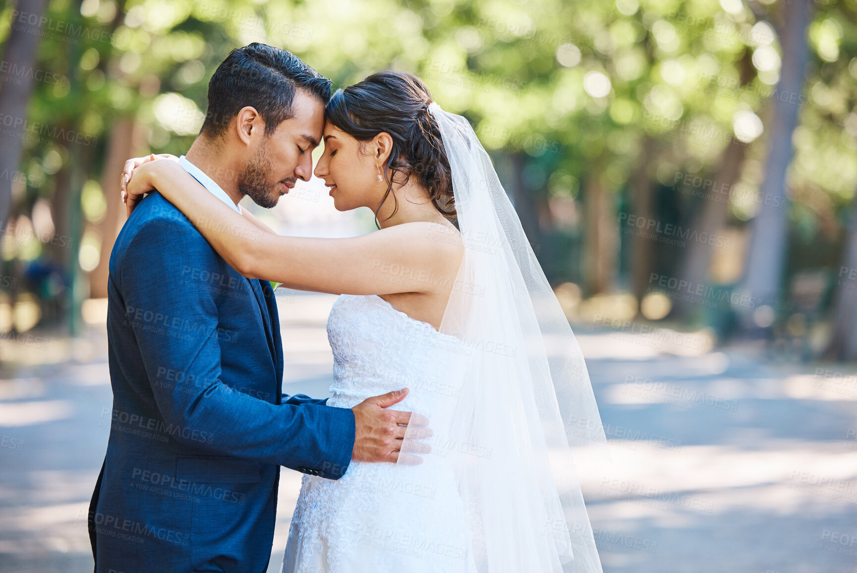 Buy stock photo Outdoor, groom and bride with love for wedding, partner  support and romantic moment for connection. Care, forehead touch and people with marriage celebration, commitment and trust for special day