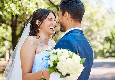 Buy stock photo Happy couple, wedding and love at park with celebration, laugh and trust with bouquet in spring. People, marriage and smile with commitment, flowers or care with funny partner for loyalty at garden