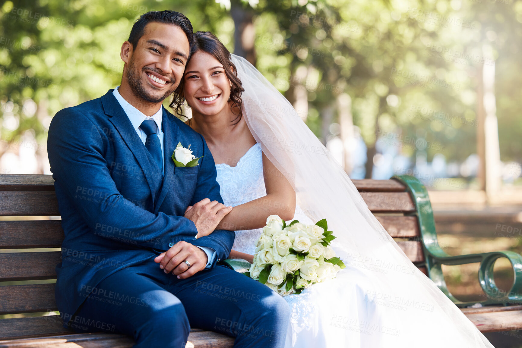 Buy stock photo Wedding, couple and happy in portrait at park bench for vow commitment, love or relationship. People, groom and bride with bouquet outdoor for marriage ceremony, union celebration or bonding together